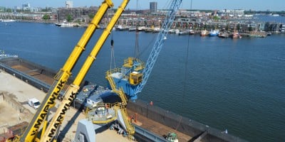 Moving and adapting grapple-top-rotating crane for Albeton